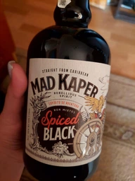 Напиток на основе рома Mad Kaper Rum Black Spiced 0.7 л 35% (5414145034854) фото от покупателей 2