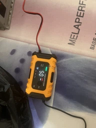 Зарядний пристрій для автомобільного акумулятора Foxsur 12V 6A фото від покупців 1