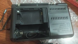 Кишеньковий акумуляторний радіоприймач з ліхтариком Golon RX 1313 чорний фото від покупців 3