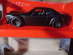 Автомодель Uni-Fortune DODGE CHALLENGER чорна, матова серія (554040М) фото від покупців 1
