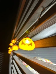Светодиодная гирлянда "Хеллоуин тыква" 12 LED, 5м + переходник, черный провод, 220V, IP44, Теплый белый фото от покупателей 3