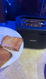 Тостер PHILIPS Essentials Collection Series 1000 HD2510/90 фото від покупців 7