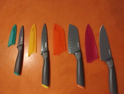Нож шеф-повара Tefal Fresh Kitchen с чехлом 15 см (K1220304) фото от покупателей 6