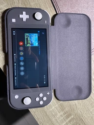 Игровая консоль Nintendo Switch Lite Yellow Bundle (игра The Legend of Zelda Breath of the Wild) фото от покупателей 1