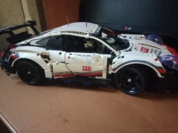 Конструктор машинка технік Porsche 911 RSR Racing Vesion Technology на 1630 деталей в масштабі 1:10 Порше авто гоночна версія фото від покупців 13