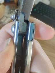 Мультиинструмент Leatherman Rev с чехлом Серый
