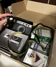 Подарочный набор камера Fujifilm Instax Mini EVO Brown, Фотобумага 50шт, Чехол, Фотоальбом 108 фото Коричневий (Подарочная упаковка) фото от покупателей 3