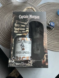Алкогольный напиток на основе Карибского рома Captain Morgan Spiced Black 1 л 40% + 2 рюмки (4820178650991) фото от покупателей 4