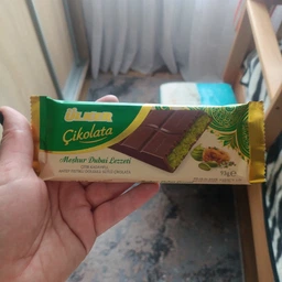 Молочный шоколад Ulker Dubai Chocolate Дубайский с фисташковой пастой и хрустящим катаифом 93 г (8690504143727) фото от покупателей 3
