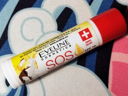 Увлажняющее-восстанавливающий бальзам для губ Eveline SOS 100% Organic Argan Oil Coconut Dream 4.5 мл (5903416017035)