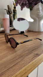 Солнцезащитные очки MIU MIU 04ZS с фиолетовой линзой Леопардовый фото от покупателей 1