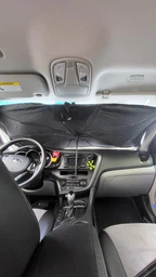 Автомобільна сонцезахисна парасолька на лобове скло 135×79 см UV, складна, чорно-сіра XJ5106 фото від покупців 1
