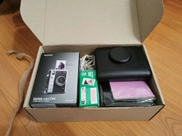 Подарочный набор камера Fujifilm Instax Mini EVO Brown, Фотобумага 50шт, Чехол, Фотоальбом 108 фото Коричневий (Подарочная упаковка) фото от покупателей 1