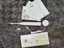 Электрическая зубная щетка Philips Sonicare HX7110/01 серии 5500 фото от покупателей 8