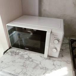 Мікрохвильова піч, 20л, мех.керув., 700Вт, сірий Beko 000330007 фото від покупців 1
