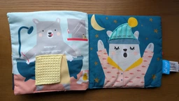 Розвиваюча м'яка книжечка Taf Toys Ведмедик Пол 8 текстурних сторінок, кріплення 12605 фото від покупців 3