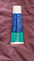 Зубная паста ферментная Curaprox Enzycal 1450 ppm 75 мл (7612412070002) фото от покупателей 19