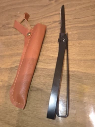 Складной нож с разбивателем стекла и кожаным чехлом SteelFolKnife, черный фото от покупателей 4
