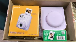 Подарунковий набір Камера для миттєвого друку Fujifilm INSTAX Mini 12 Lilac Purple / Фіолетовий чохол / Картриджі на 50 фото / Фіолетовий фотоальбом на 64 фото