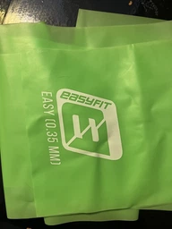 Эластичная лента EasyFit 0.35 мм зеленая для фитнеса и йоги (еспандер ленточный для пилатеса, йоги, реабилитации) SC1724G фото от покупателей 6