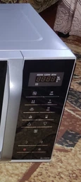 Микроволновая печь Panasonic, объемом 25 литров, мощностью 900 Вт, с дисплеем и кнопкой открывания, белая (629808)