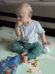 Кукурудзяні снеки Gerber з Полуницею та Бананом для дітей із 7 місяців 28 г (8445291463554) фото від покупців 1