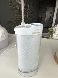 Ирригатор Philips Sonicare HX3333/24 Compact Flosser 1000 фото от покупателей 6