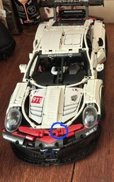 Конструктор автомобіля Porsche 911 RSR на 1580 деталей в масштабі 1:10 з двигуном, LED підсвіткою і пультом дистанційного управління