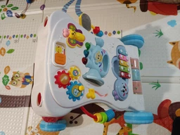 Детская каталка-ходунки с игровой музыкальной панелью и развивающими играми