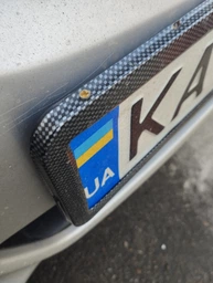 Рамка на номер авто Avtoaks карбонова нержавіюча без сітки фото від покупців 2