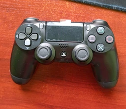 Геймпад PS4 бездротовий DualShock 4 джойстик Bluetooth акумуляторний контролер для ігор консолі смартфона планшета сумісний з ПК смартфоном Android iOS iPad V2 Sony wireless USB зарядка портативний ігровий ергономічний тригерний оригінал pro чорний фото від покупців 14