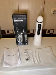 Ирригатор для полости рта 200 мл беспроводной аккумуляторный Oral Irrigator, портативный с 3 режимами работы и 4 сменными насадками для ухода за зубами, деснами и брекетами Белый, RGL-137-White фото от покупателей 9