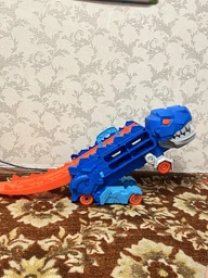 Динозавр-грузовик T-Rex на 12 машинок с трамплином и пусковым механизмом фото от покупателей 1