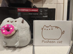 Мягкая игрушка кот Пушин кэт Pusheen cat S&T с Пончиком в лапках 15х12 см Серый (n-71) фото от покупателей 1
