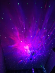 Лазерный ночник-проектор звездного неба Астронавт/Космонавт на пульте управления 8 галактик, белый (D-2019091323) фото от покупателей 2