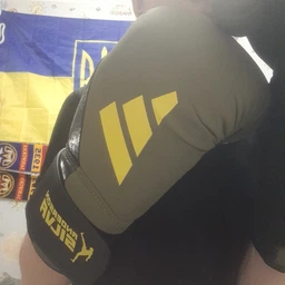 Боксерские перчатки Adidas x Anderson Silva (ADIAS50TG) Black/Yellow 10 унций фото от покупателей 2
