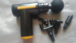 Перкуссионный массажный пистолет для тела Massage Gun вибромассажер для мышц красный фото от покупателей 2