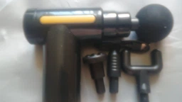 Перкуссионный массажный пистолет для тела Massage Gun вибромассажер для мышц красный фото от покупателей 1