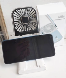 Вентилятор мини портативный аккумуляторный с павербанком 3000 mAh с подставкой для телефона ручной на шею с USB белый + черный фото от покупателей 1