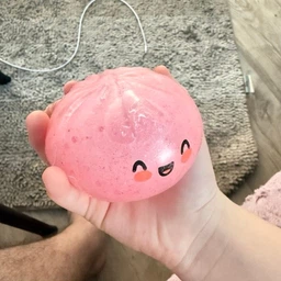 Антистрес сквіш пельмень Mystery Dumpling з глітером 8.5 см у коробочці 10 см | Сквіш Хінкаль в булочці Бао
