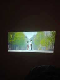 Смарт проектор SMART 4K Projector Ultra HD до 130 дюймів, міні, портативний,HDMI-сумісний, повна підтримка Android та iOS , Bluetooth 5.0, Wi-Fi 6, мультимедійний домашній кінотеатр, чорний фото від покупців 1