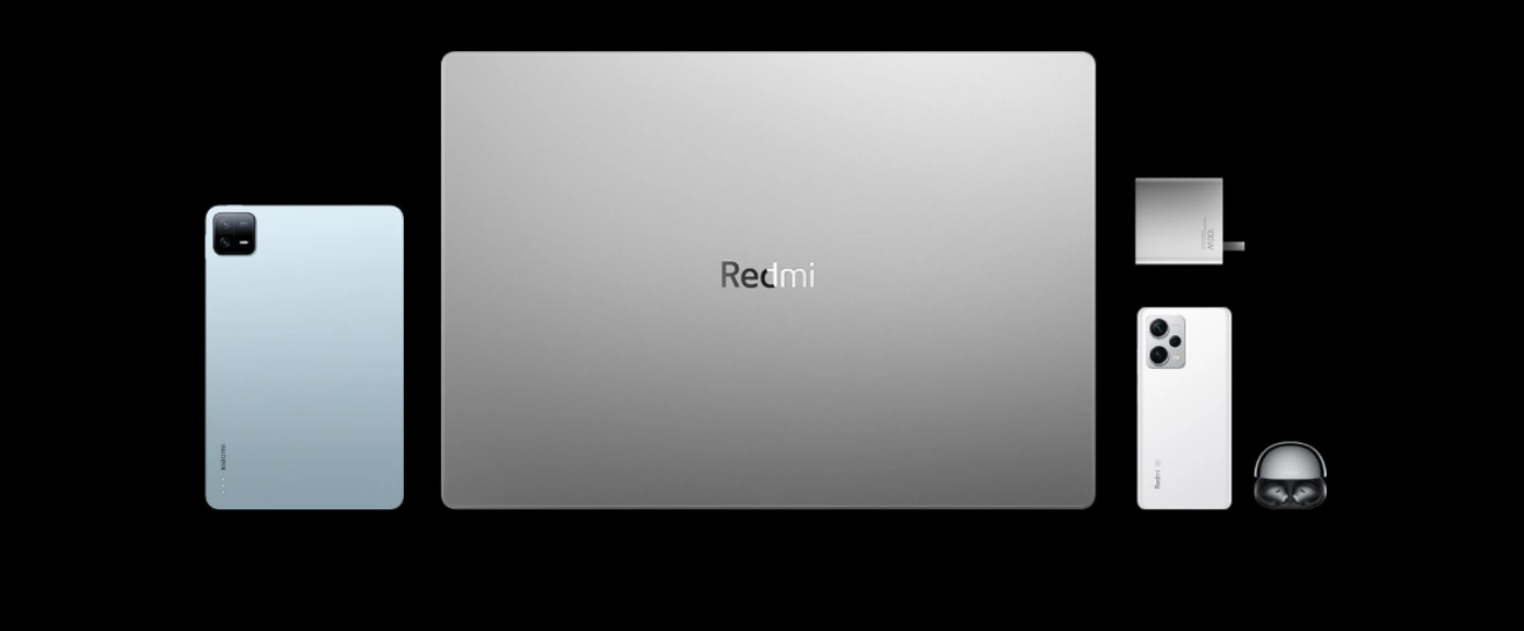 Ноутбук RedmiBook 14 вместе с планшетом, смартфоном и наушниками Xiaomi