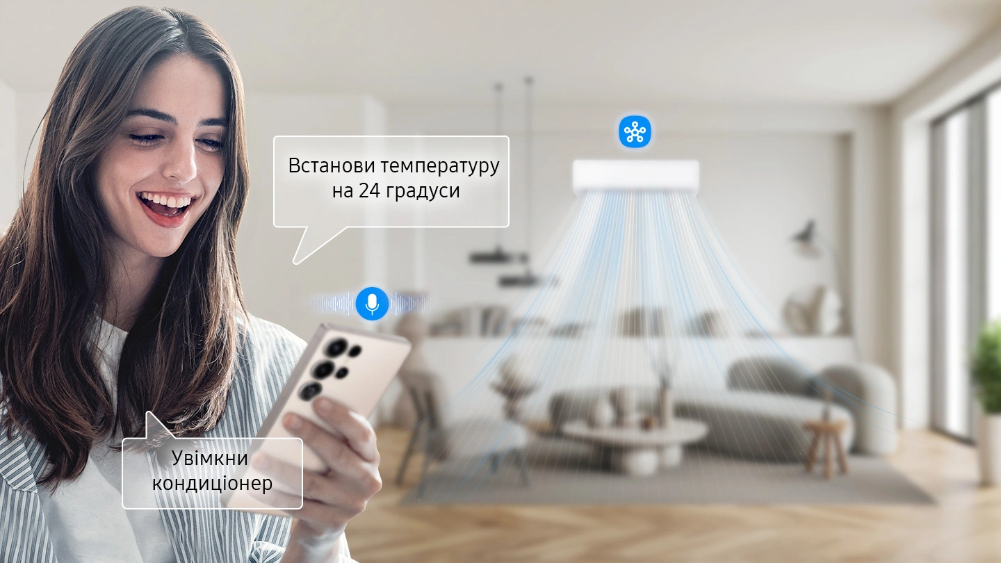 Жінка керує кондиціонером Samsung AR40H голосом через смартфон зі SmartThings