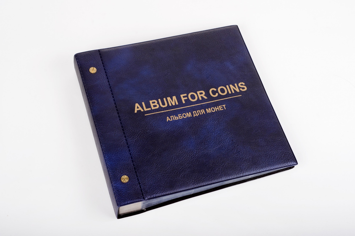 Что представляют собой альбомы для монет и банкнот издательства «КоллекционерЪ»?