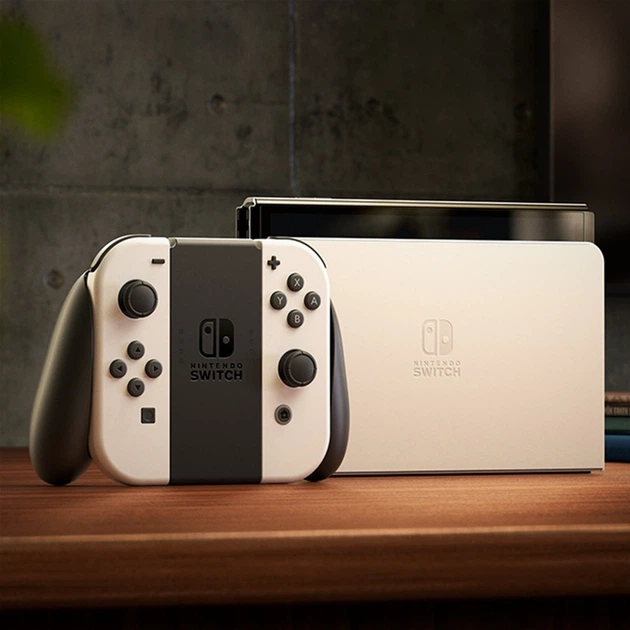 Игровая консоль Nintendo Switch OLED с белыми Joy-Con – фото
