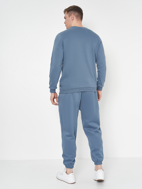 teal puma tracksuit