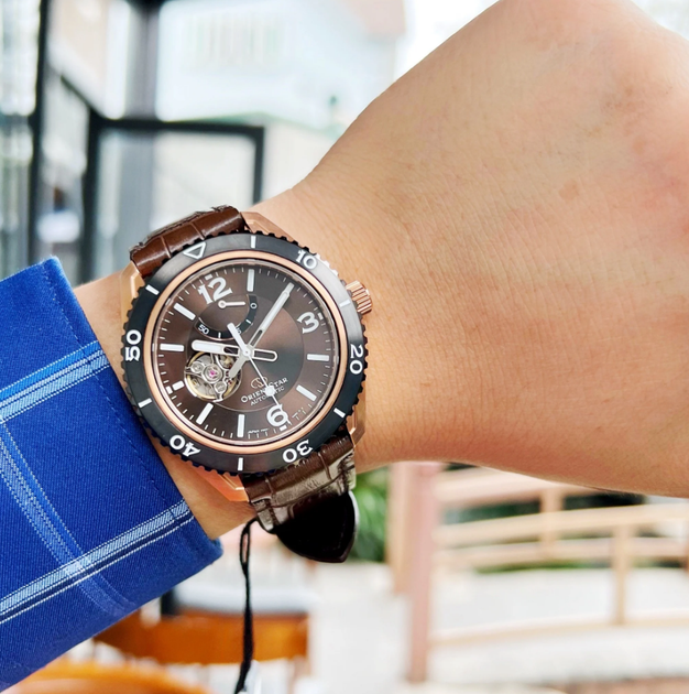 Чоловічий годинник-скелетон Orient RE-AT0103Y00B Золото\Коричневий - зображення 5