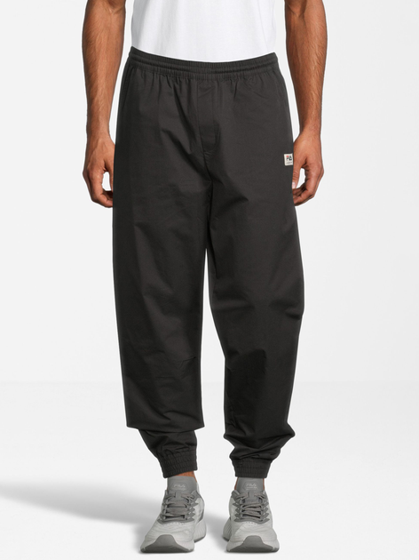 Спортивні штани чоловічі Fila FAM0145-80001 XL Чорні (4064556288806) - зображення 1