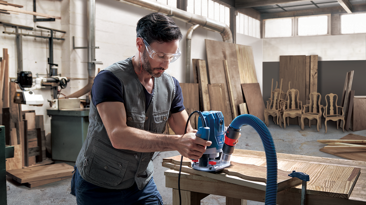 Фрезер Bosch Professional GOF 130, 1300 Вт, 28000 об.мин, константная электроника, регулировка скорости, Restart protection, кнопка блокировки шпинделя (06016B7000) - Фото 17 Фрезер Bosch Professional GOF 130, 1300 Вт, 28000 об.мин, константная электроника, регулировка скорости, Restart protection, кнопка блокировки шпинделя (06016B7000) - изображение 17