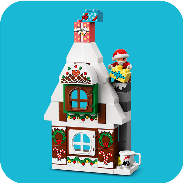 Zestaw klocków LEGO DUPLO Town Piernikowy domek Świętego Mikołaja 50 elementów (10976) - obraz 7